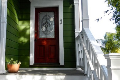 Deck - small victorian side yard deck idea in San Francisco with a roof extension