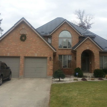 Houses with Hy-Grade's permanent steel roofing "cure"