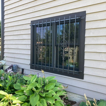 After / Adding Security With WIndow Guards & Security Storm Doors