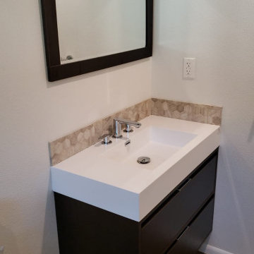 Big Mirror and Compact Cabinetry for an Uncluttered Bathroom