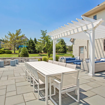 Warren, NJ Beautiful transformation - Blue stone patio with pergola and fire pit