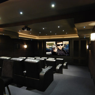 Inspiration for a small contemporary enclosed home cinema in Toronto with grey walls, carpet and a projector screen.