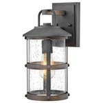 Hinkley - Hinkley 2680DZ Lakehouse - One Light Outdoor Small Wall Lantern - The look is relaxed, but the components of Lakehouse are quietly satisfying. Lakehouse features a distressed, Aged Zinc finish with clear seedy glass. Driftwood Grey finish rings add a wooden look to round out the coastal casual style. Cast aluminum construction ensures Lakehouse will withstand for years. Blissfully simple, yet all the details are memorable.  2 Years Finish/12 Years on Electrical Wiring and Components  Shade Included: YesLakehouse One Light Outdoor Small Wall Lantern Aged Zinc/Driftwood Grey Clear Seedy Glass *UL: Suitable for wet locations*Energy Star Qualified: n/a  *ADA Certified: n/a  *Number of Lights: Lamp: 1-*Wattage:100w Medium Base bulb(s) *Bulb Included:No *Bulb Type:Medium Base *Finish Type:Aged Zinc/Driftwood Grey