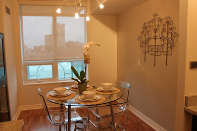 Example of a trendy dining room design in Toronto