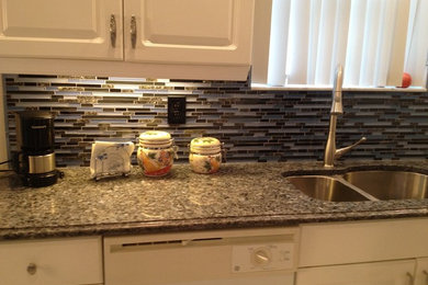 Example of a transitional kitchen design in Miami