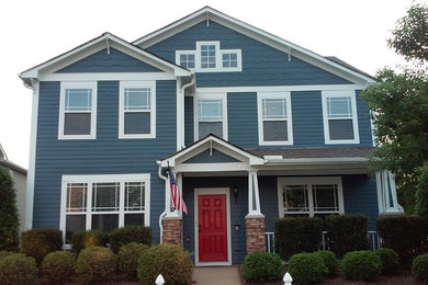 Inspiration for a mid-sized timeless blue two-story wood exterior home remodel in Atlanta