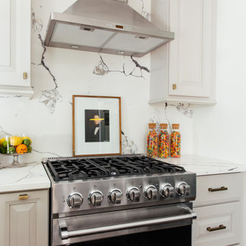 Modern Kitchen Transformation with Mudroom Nook and Eclectic Dining Room