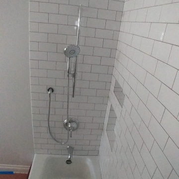 White Dimensional Tiles on Bathroom Backsplash