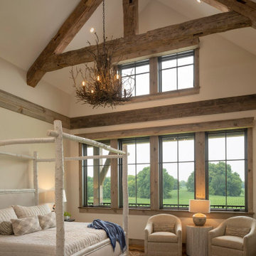 Weathered Antique Cathedral Ceiling Timber Trusses in a Rustic Bedroom