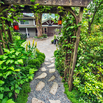 Flagstone path transitions from patio to gardens