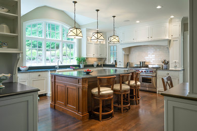 Kitchen - traditional kitchen idea in Boston with subway tile backsplash