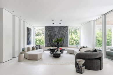 Trendy white floor living room photo in Miami with white walls
