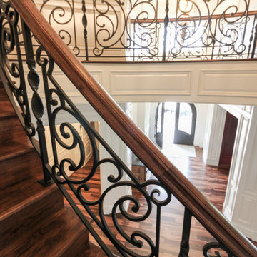 Project #74 | Circular Staircase with Hand-Forged Metal Panels