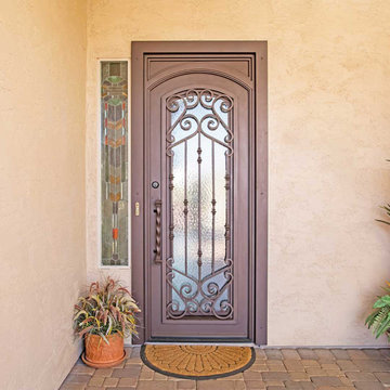 French Tip Iron Entry Door with Arch in Square Frame & Twisted Bauble Handle