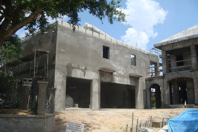 Beach style home design photo in Other