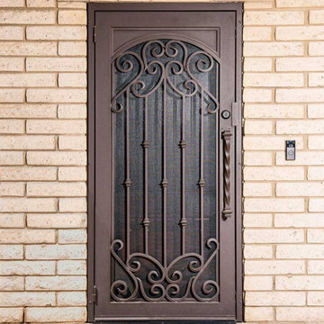 French Tip Iron Security Door with Arch in Square Frame