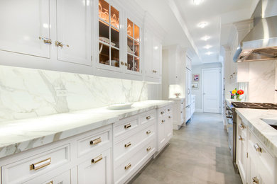 Example of a transitional kitchen design in New York