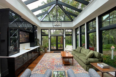 Inspiration for a large timeless brown floor sunroom remodel in Jacksonville with a glass ceiling