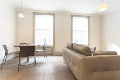 Design ideas for a contemporary dining room in London.