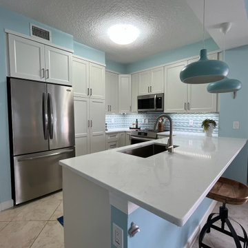 Contemporary Kitchen Remodel Done in a White Portland Door