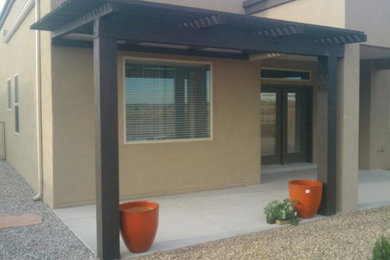 Design ideas for a large partial sun backyard landscaping in Albuquerque.