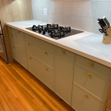 IKEA Kitchen with Custom White Oak and Sage Green Doors by Allstyle