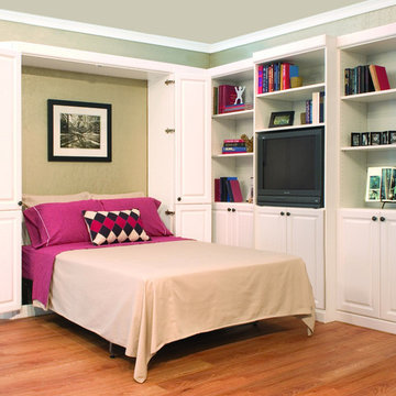 White Murphy bed with bi-fold doors and media center