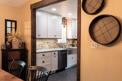 Example of a farmhouse dining room design in Other
