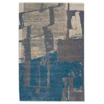 Jaipur Living - Nikki Chu by Jaipur Living Lehana Abstract Blue/Gray Area Rug 9'6"x12'7" - Inspired by the African motifs, the Sanaa collection by Nikki Chu is the perfect combination of statement-making patterns and easy-to-decorate-with hues. The Lehana rug boasts a color-blocked abstract design in tones of blue, gray, and beige with hints of tan. Ivory fringe trim adds texture and vintage allure. This power-loomed rug features a plush and durable blend of polyester and polypropylene, lending the ideal accent to high-traffic spaces.