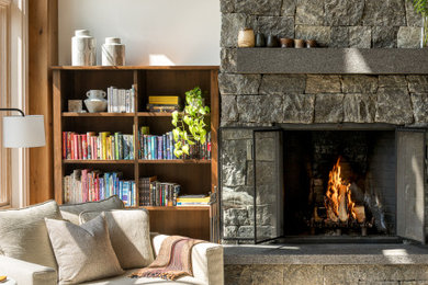 Example of a mountain style living room design in Burlington