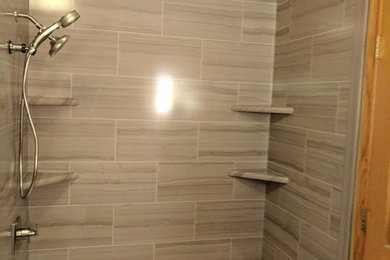 Small classic shower room bathroom in Salt Lake City with an alcove bath, a shower/bath combination, beige tiles, porcelain tiles, beige walls and a shower curtain.