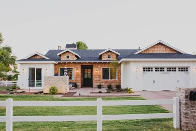 Inspiration for a large farmhouse home design remodel in Phoenix