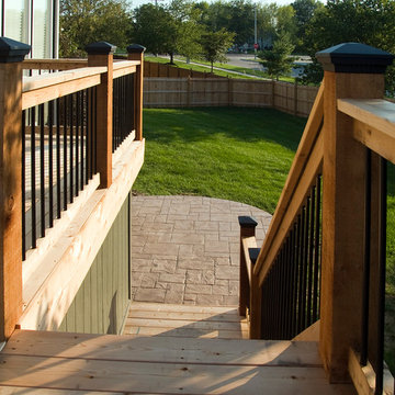 Smith - Cedar deck in Kansas City with stamped concrete patio.