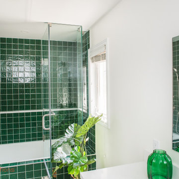 Vibrant Green Ceramic Tiles Bring Life to a Hallway Bathroom