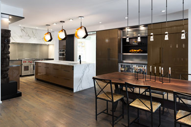 Large contemporary u-shaped eat-in kitchen in Other with an undermount sink, flat-panel cabinets, dark wood cabinets, marble benchtops, panelled appliances, dark hardwood floors, with island, brown floor, grey benchtop, beige splashback and glass sheet splashback.