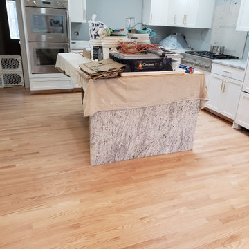Hawthorn Woods,  2 and 1/4 red oak , 3 coats Bona Traffic Hd