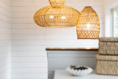 Example of a beach style entryway design in Other