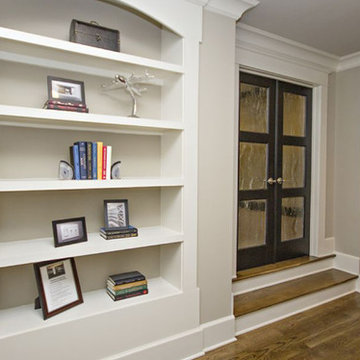 Traditional hallway with door to game room