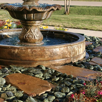 Colorful Fountain Garden with Rock Walkway