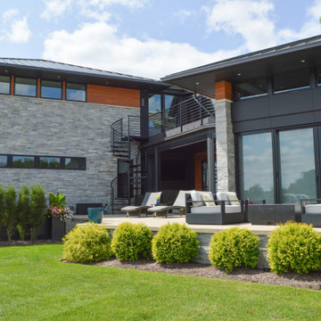 Contemporary Lake House Exterior - view of 2-story addition