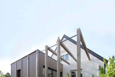 Inspiration pour une façade de maison design.
