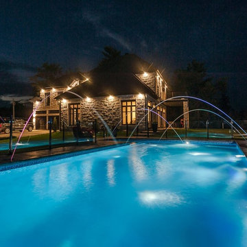 Hilltop multi level automated pool with lighted water features