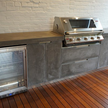 Outdoor Kitchen with Polished Concrete bench top, doors and drawer fronts