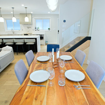 Set Wood Dining Table Beneath a Glass Pendant | North York