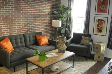 Mid-sized modern loft-style living room in Cincinnati with white walls and a wall-mounted tv.