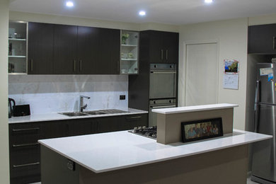 This is an example of a contemporary kitchen in Townsville.