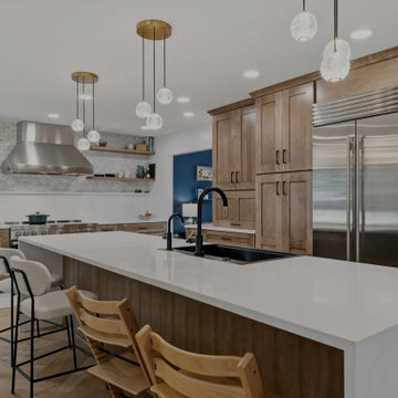Warm Cherry Kitchen and Powder Room Remodel with Waterfall Island in Herndon, VA