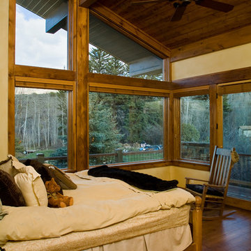 Rustic Cabin Bedroom with Glass Walls