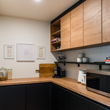 Stunning Black and Wood-Look entertainers kitchen