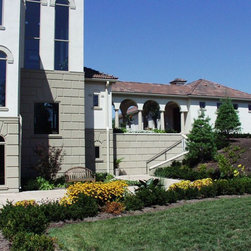 Mediterranean Style Residence - Siding And Stone Veneer